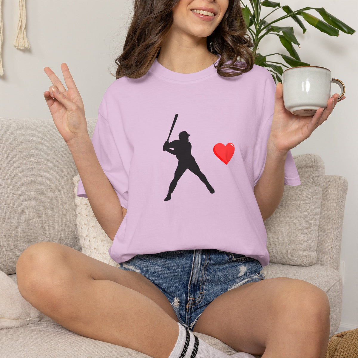 Printify baseball batter heart T-shirt showing a graphic of a batter swinging with a heart design on the front.