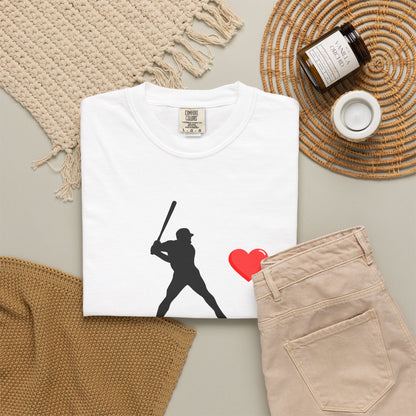 Printify baseball batter heart T-shirt featuring a graphic of a batter swinging with a heart design on the front.
