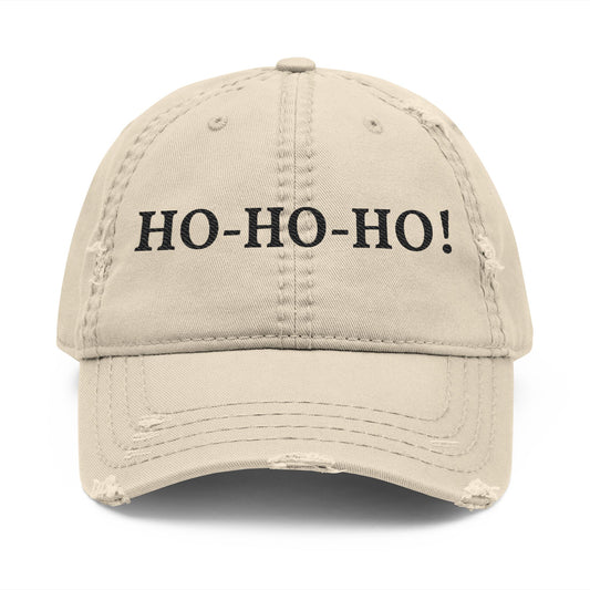 Distressed embroidered "HO-HO-HO" dad hat by Printify, a casual baseball cap with festive holiday design and adjustable strap.