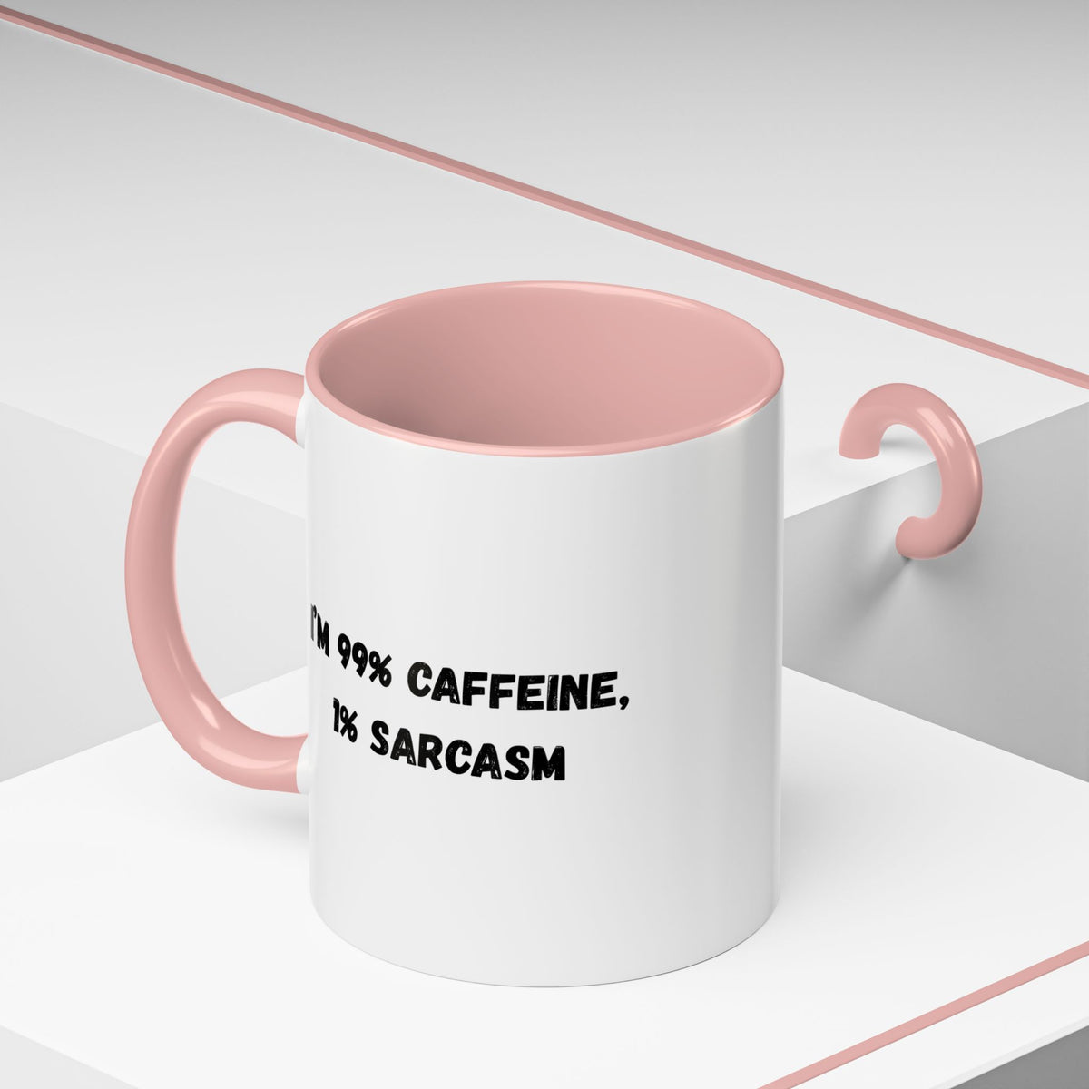 Ceramic coffee mug with "I'm 99% Caffeine, 1% Sarcasm" print, designed for coffee lovers and humor enthusiasts.