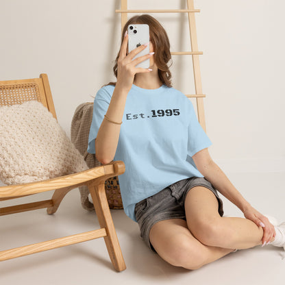 Vintage minimalist Est. 1995 T-shirt by Printify featuring a simple "Born in 1995" design on a classic crewneck tee.