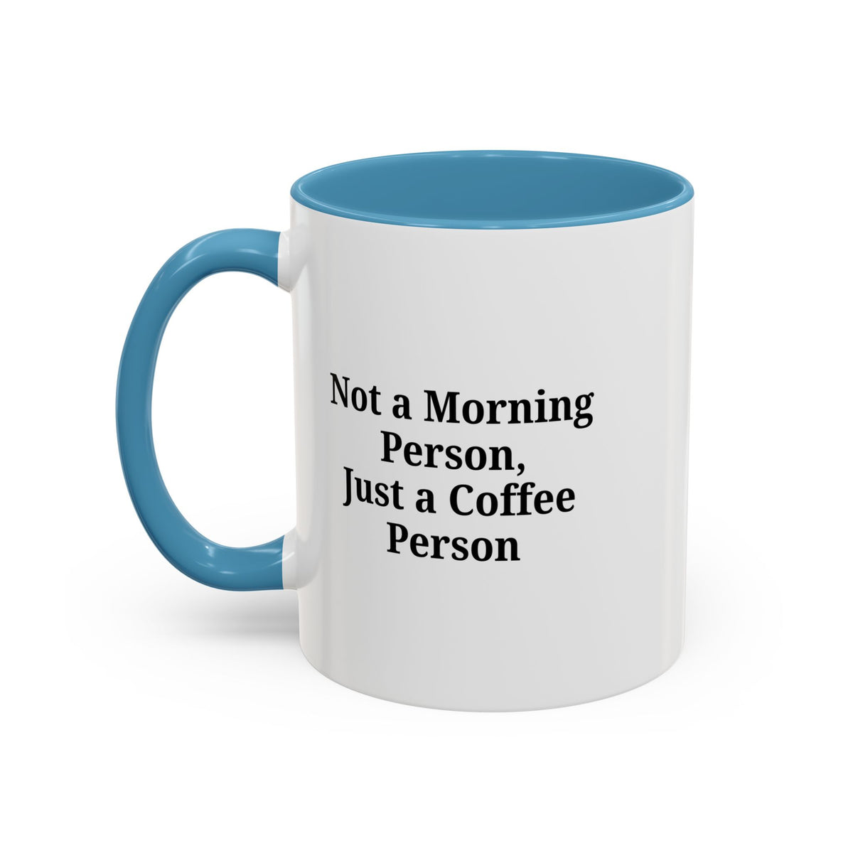 Ceramic coffee mug with "Not a Morning Person, Just a Coffee Person" printed in black text on white background