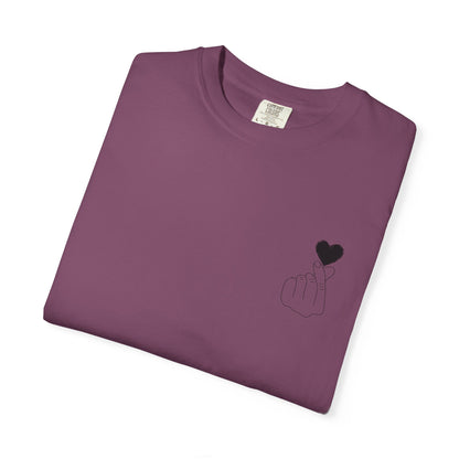 Black T-shirt with a minimal white finger heart graphic print, casual style from Printify.