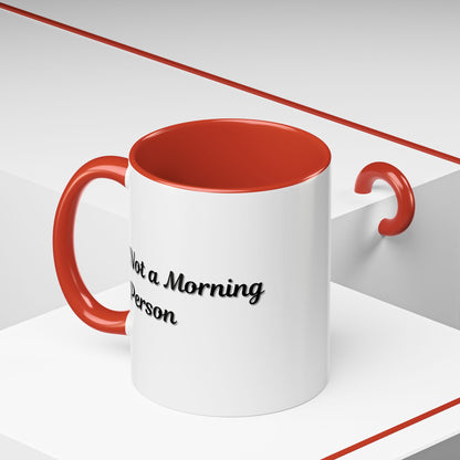 Ceramic "Not a Morning Person" coffee mug with 11oz or 15oz capacity, featuring bold text design on a white background.