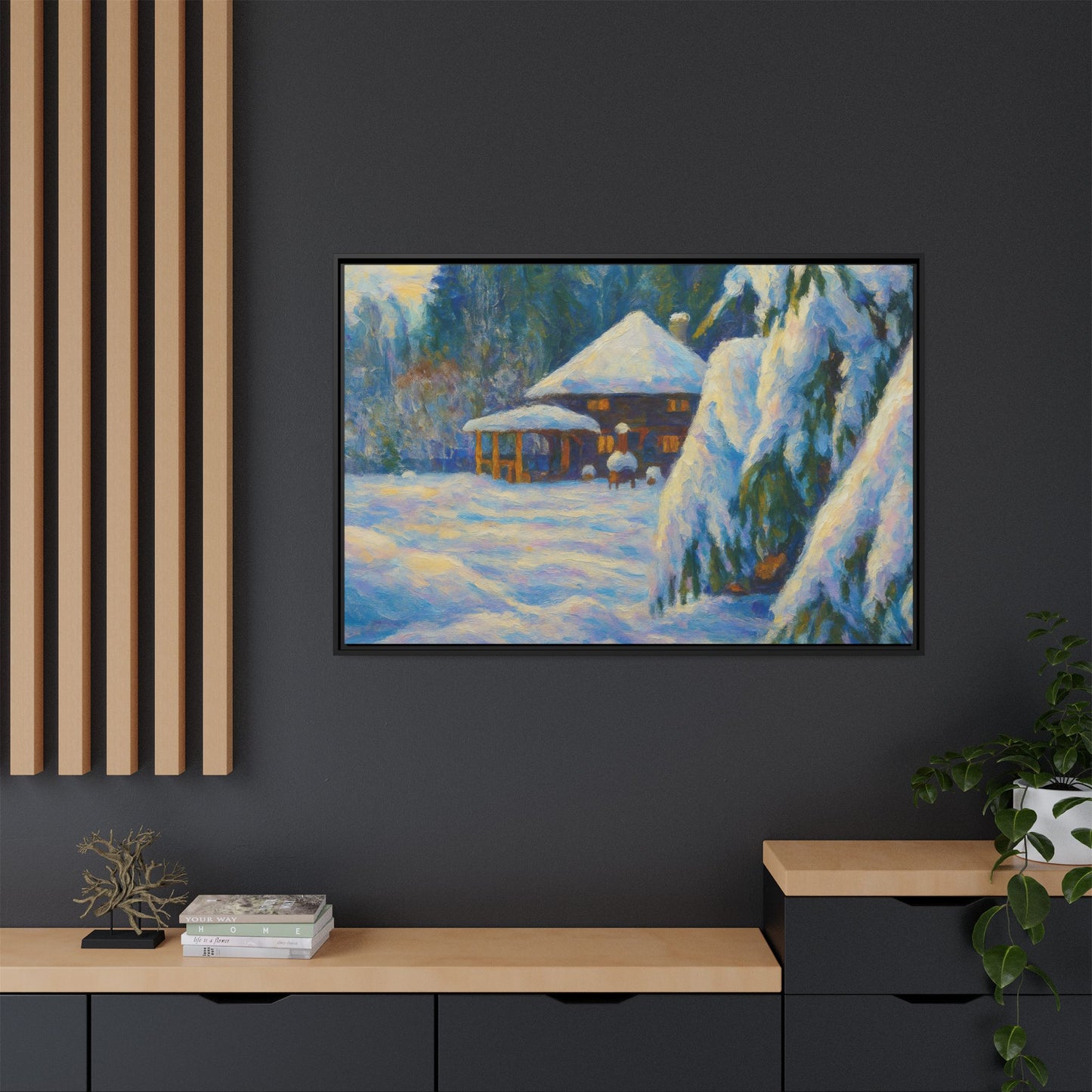 Framed matte canvas wall art of a snowy cabin winter landscape, featuring a cozy cabin surrounded by snow-covered trees.