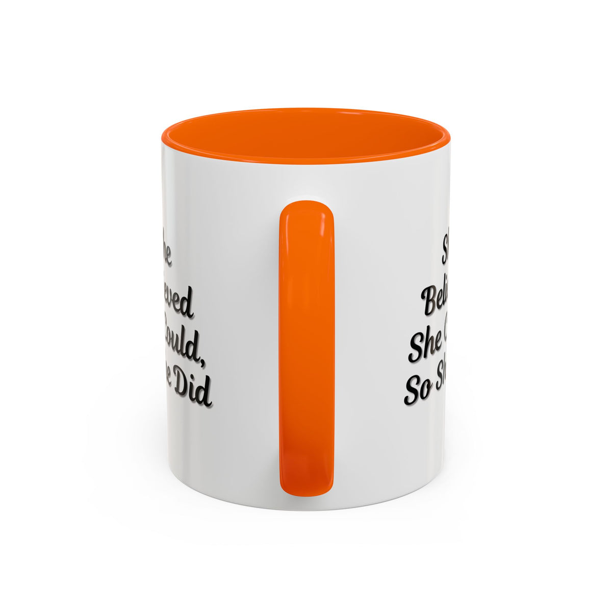 Motivational coffee mug with the quote "She Believed She Could, So She Did" in black lettering on a white ceramic mug.