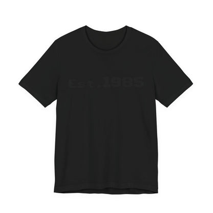 Vintage Est. 1985 graphic T-shirt by Printify featuring a retro year design on a casual cotton tee.