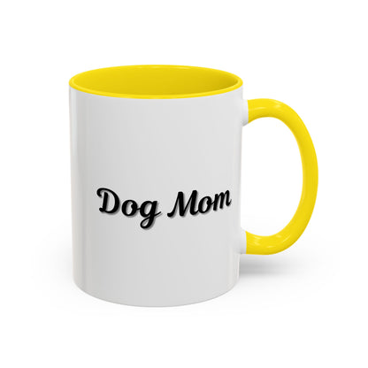 Dog Mom Accent Coffee Mug — white ceramic coffee mug with retro script "Dog Mom" print, colored interior and C-handle, 11oz/15oz, styled lifestyle product photo