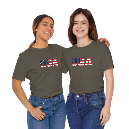 White T-shirt featuring a USA flag graphic and patriotic text, ideal for Fourth of July celebrations.