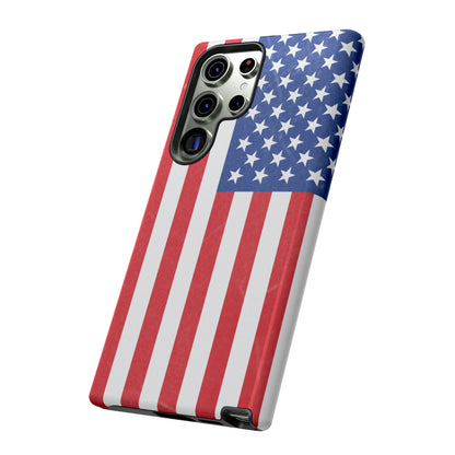 Durable American flag tough phone case for iPhone with patriotic design, made by Printify, offering protection and style.