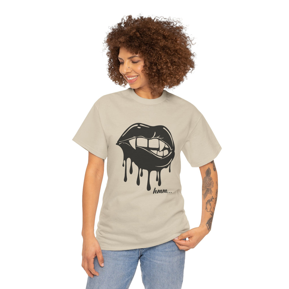 Graphic T-shirt featuring a dripping lips 'hmm...' bite design by Printify, with a bold, artistic print on the front.