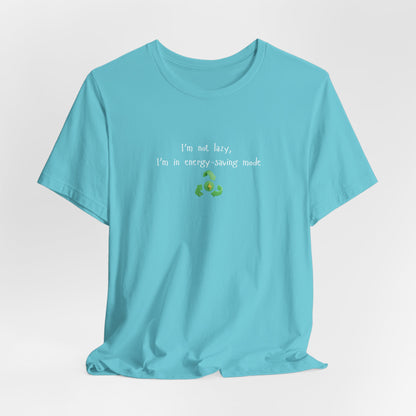 Green eco humor T-shirt with the phrase "I’m Not Lazy, I’m an Energy-Saving Mock" printed on a casual cotton tee.