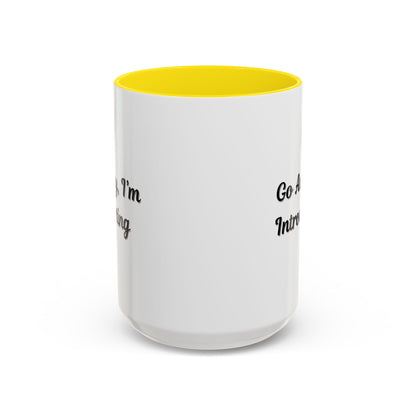 Ceramic introvert coffee mug with "Go Away, I'm Introverting" quote, 11 oz size, featuring a white background and black text.