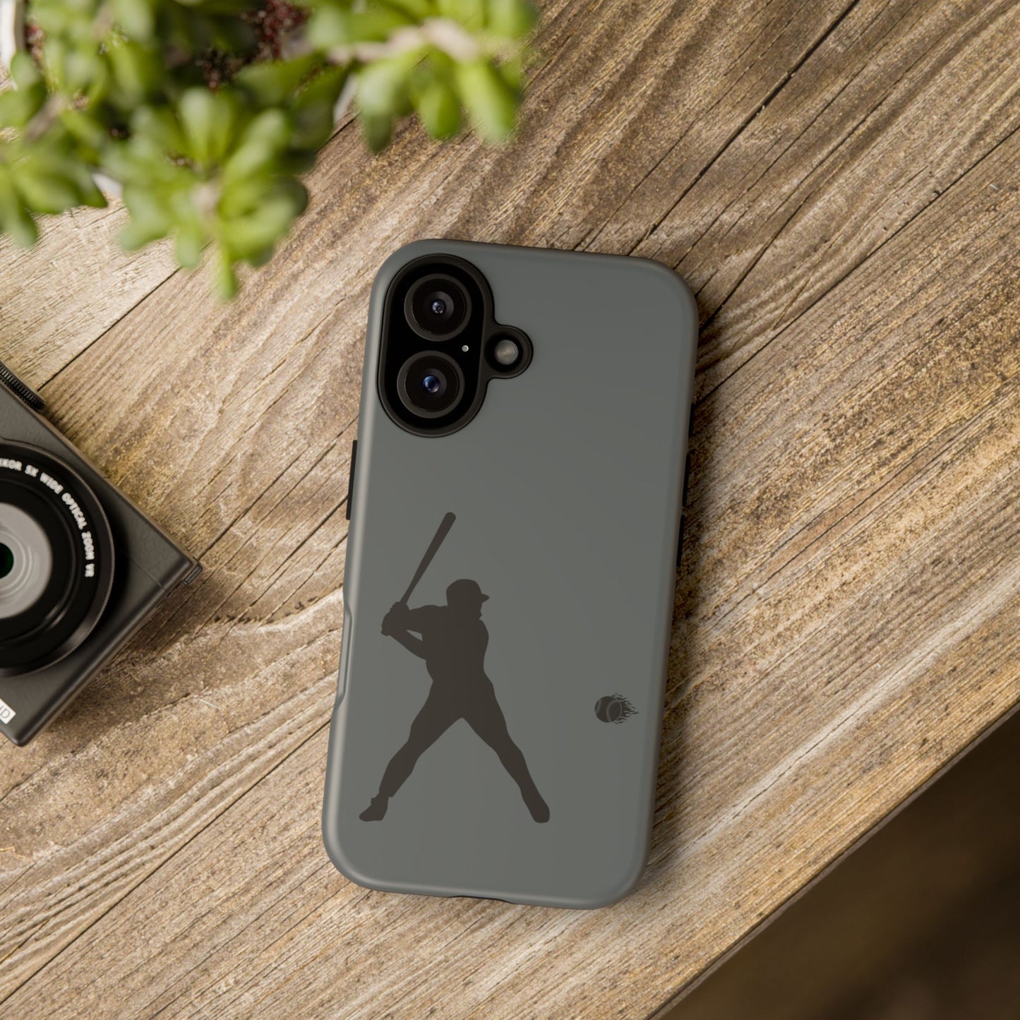 Black baseball silhouette tough phone case for iPhone, protective sporty design by Printify, with a rugged, durable appearance.