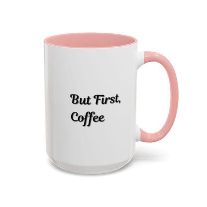 Black handle and rim coffee mug with "But First Coffee" print, 11oz size, by Printify, shown with a cozy coffee setting.