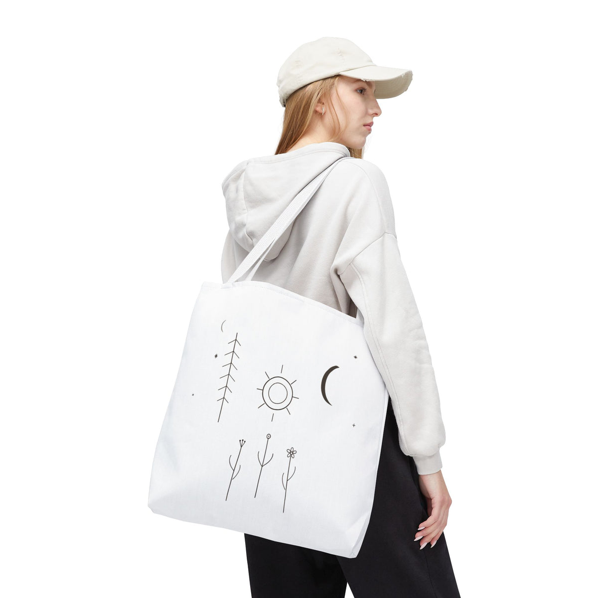 Minimal Moon and Sun botanical tote bag featuring celestial line art, made by Printify, with natural floral and celestial design.