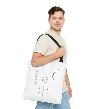 Minimal moon and sun botanical tote bag featuring celestial line art, made by Printify, with a natural fabric appearance.