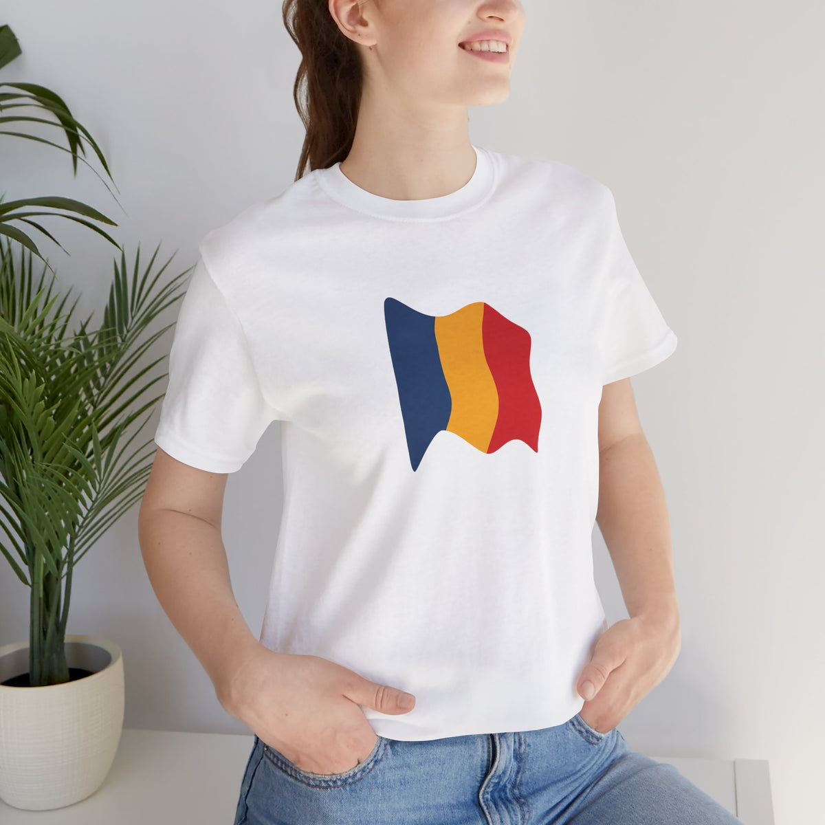 Romania flag T-shirt by Printify featuring a minimal waving tricolor design, casual cotton T-shirt for national pride.
