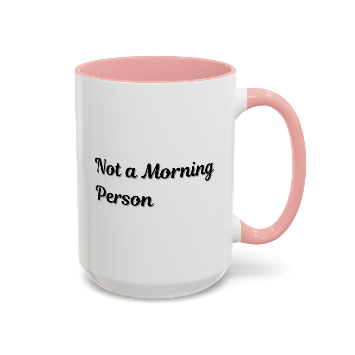 Ceramic coffee mug with "Not a Morning Person" print, 11oz or 15oz size, from Printify, shown with a cozy coffee setting.