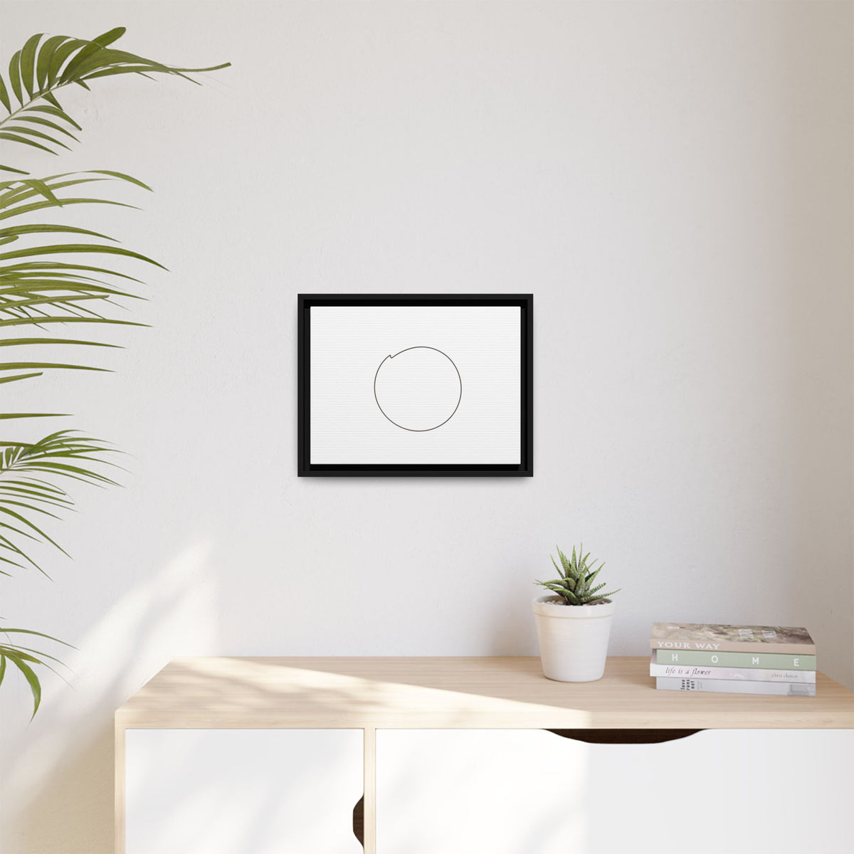 Framed matte canvas wall art featuring a minimal circular line design, by Printify, displayed on a wall.