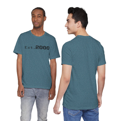 Retro pixel design T-shirt with "Born in 2000" text, printed on a casual Printify T-shirt, celebrating the year 2000.