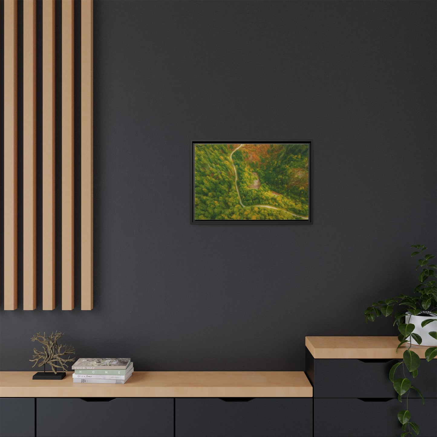 Framed matte canvas wall art of a colorful aerial forest path landscape by Printify, perfect for nature-themed home decor.