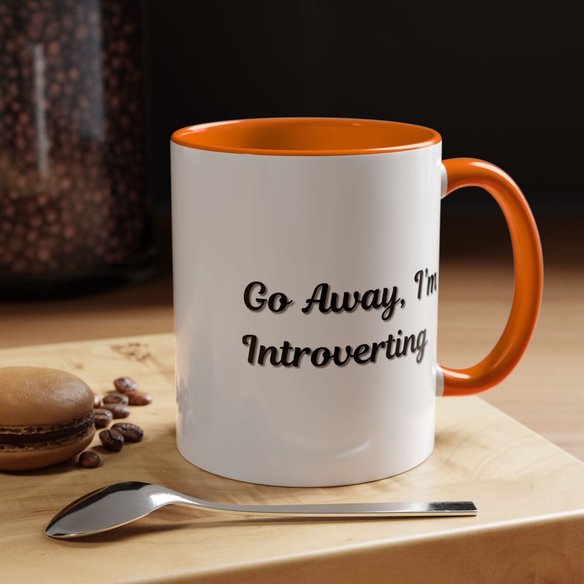 Ceramic coffee mug with "Go Away, I'm Introverting" slogan in black text, 11 oz size, ideal for introverts.