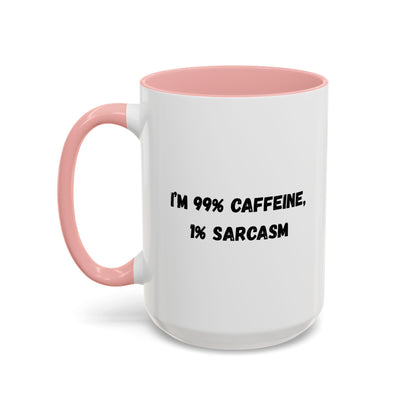 White ceramic coffee mug with "I'm 99% Caffeine, 1% Sarcasm" print, featuring a humorous design and a comfortable handle.