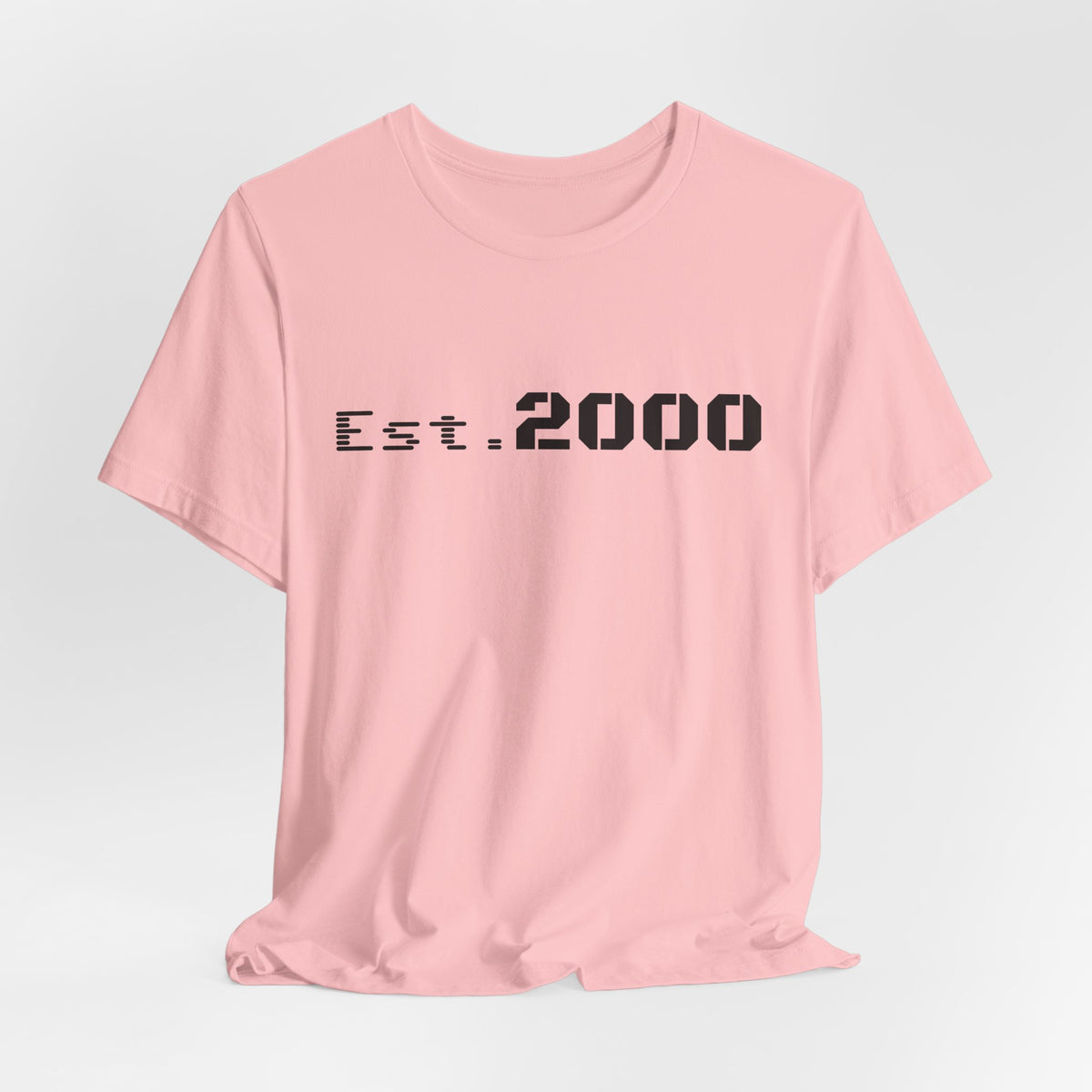 Retro pixel-style T-shirt celebrating 2000 birth year, featuring bold "Born in 2000" design on a comfortable Printify T-shirt.