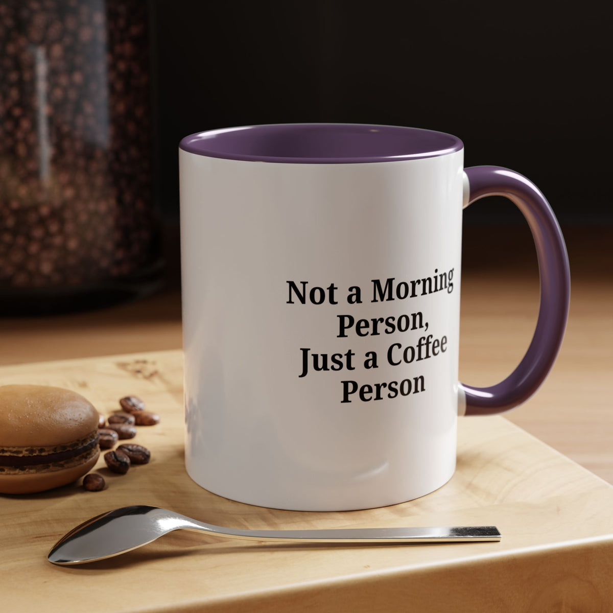 Ceramic coffee mug with "Not a Morning Person, Just a Coffee Person" print, designed by Printify, shown on a white background.