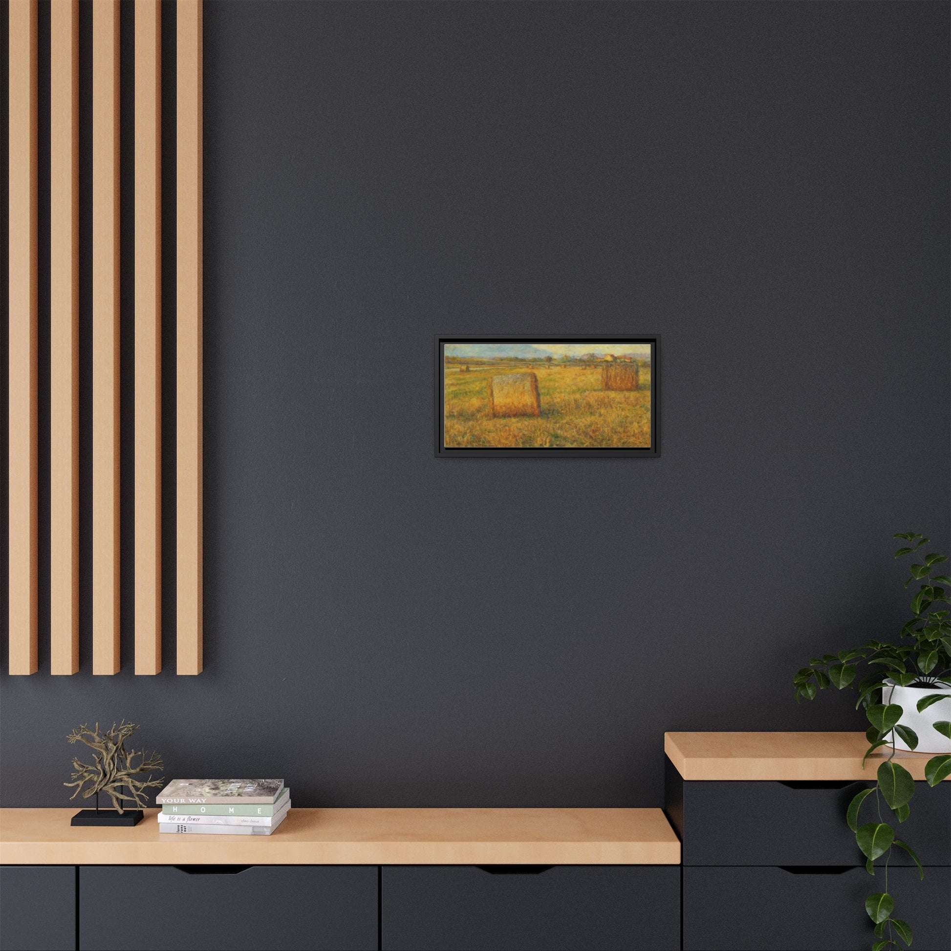 Framed matte canvas wall art featuring a rustic hayfield landscape print by Printify, showcasing natural rural scenery.