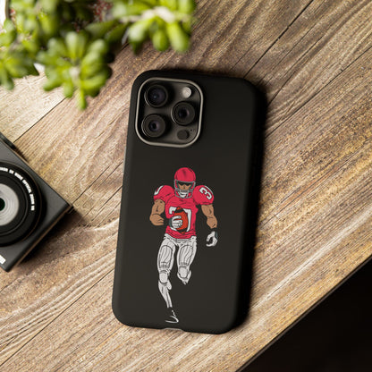 Black football player tough phone case for iPhone, protective sports-themed case by Printify with athletic design.