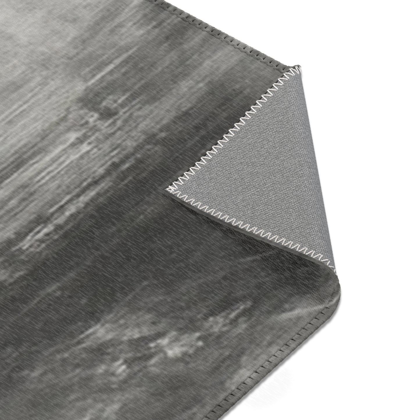 Abstract gray watercolor area rug by Printify, modern neutral design, perfect for living room accents.