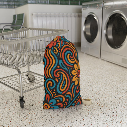 Retro floral swirl laundry bag with boho flower design, drawstring closure, made by Printify for stylish laundry storage.