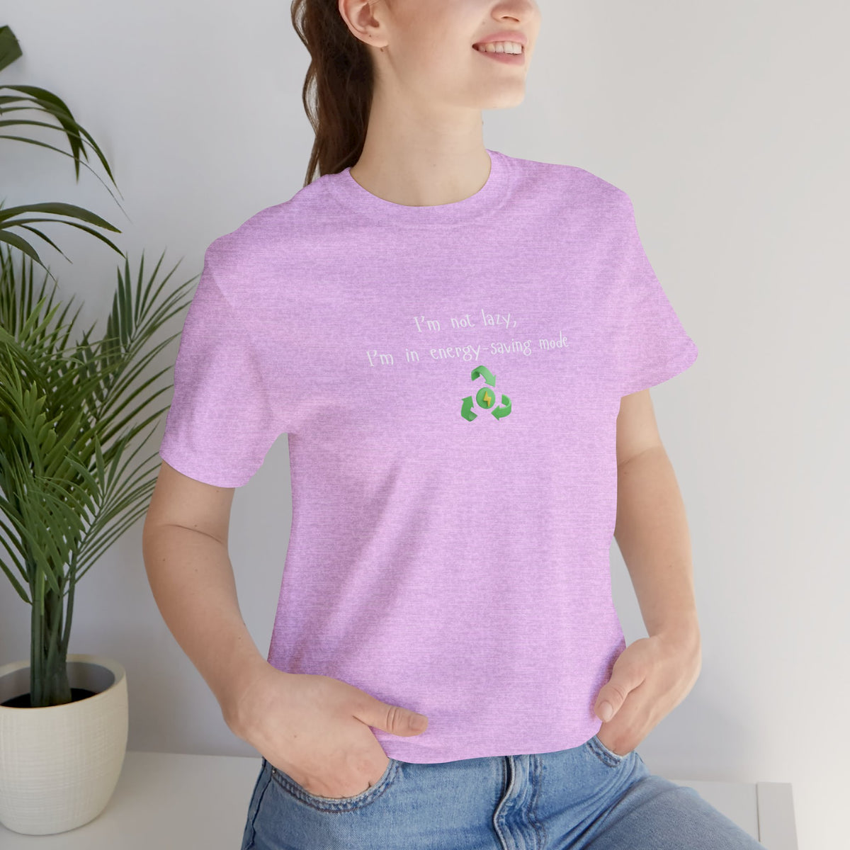 Eco humor T-shirt from Printify featuring the phrase "I’m Not Lazy, I’m an Energy-Saving Mock" on a casual cotton tee.