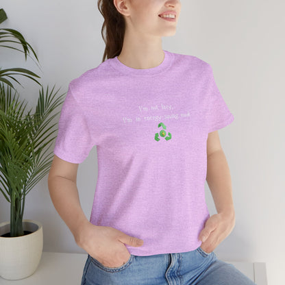 Eco humor T-shirt from Printify featuring the phrase "I’m Not Lazy, I’m an Energy-Saving Mock" on a casual cotton tee.