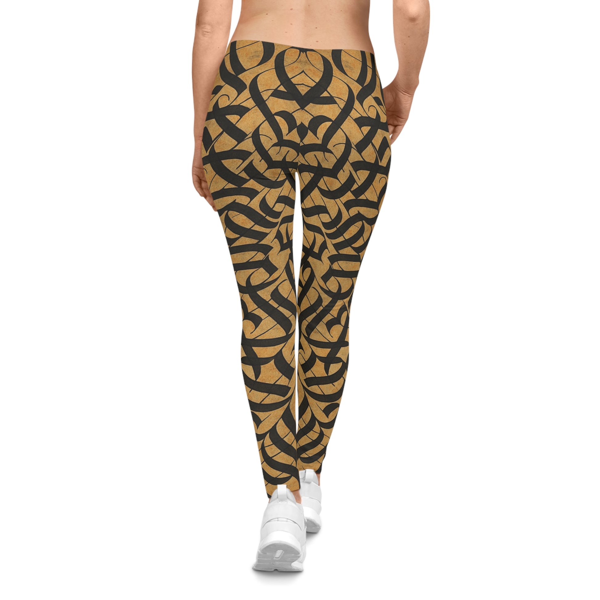 Black and gold tribal knotwork print women's leggings with all-over intricate design by Printify