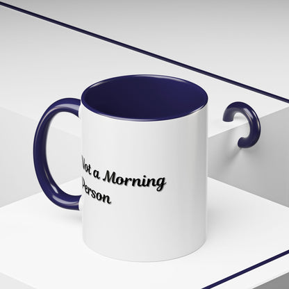 11oz ceramic "Not a Morning Person" coffee mug by Printify, featuring bold text and a white ceramic finish.