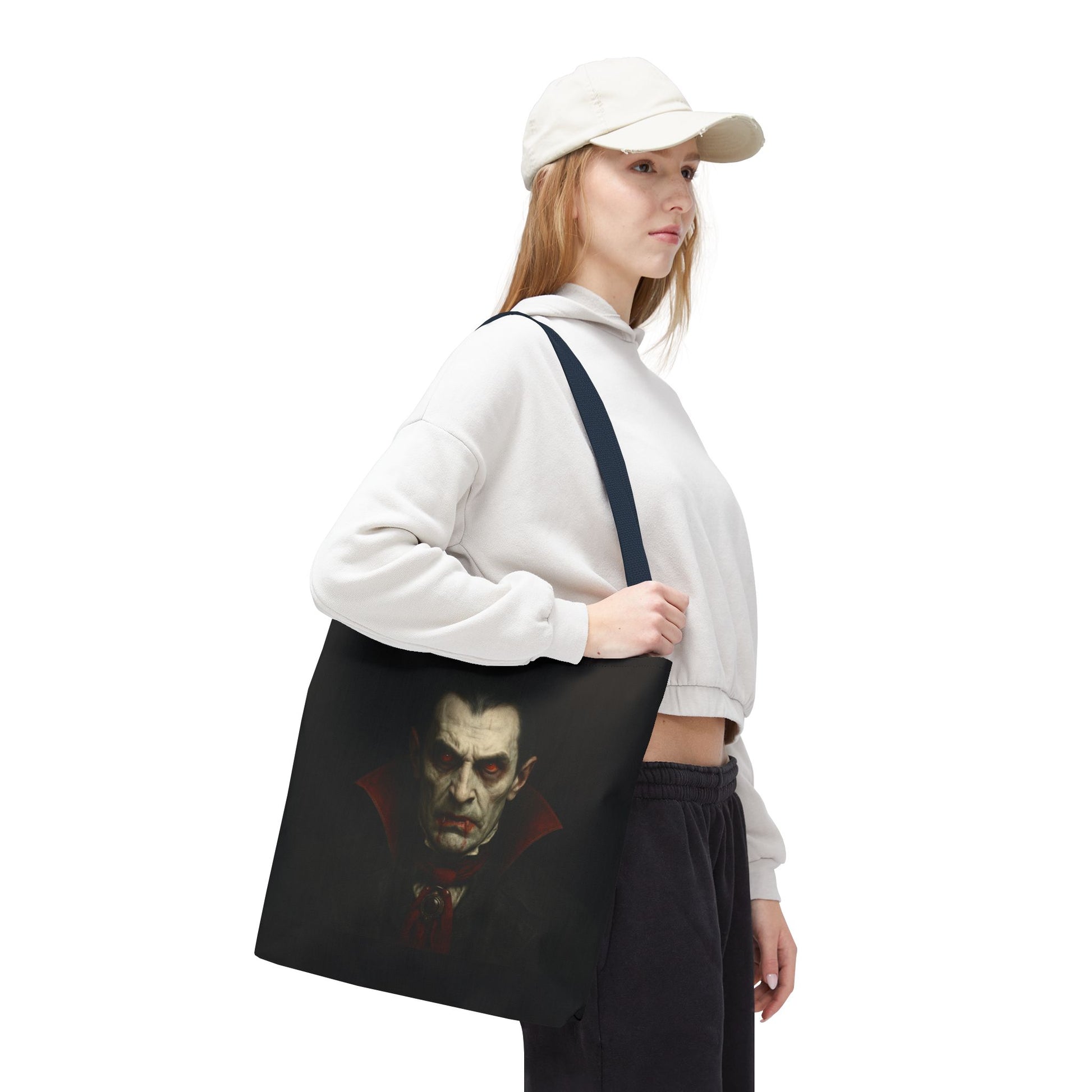 Black vampire tote bag featuring spooky gothic design, perfect for Halloween accessories, by Printify.