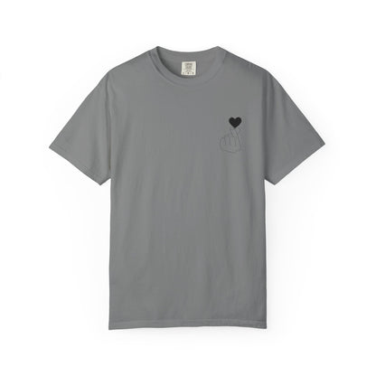 Black T-shirt featuring a minimal white finger heart graphic, designed by Printify, casual and stylish men's or women's tee.