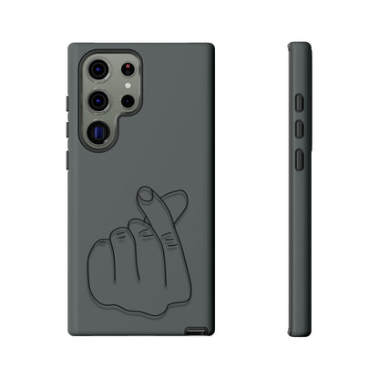 Silicone phone case with embossed Korean finger heart design from Printify, featuring a smooth surface and detailed pattern.