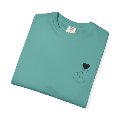 Black T-shirt with a minimal white finger heart graphic, featuring a simple heart design on the front.