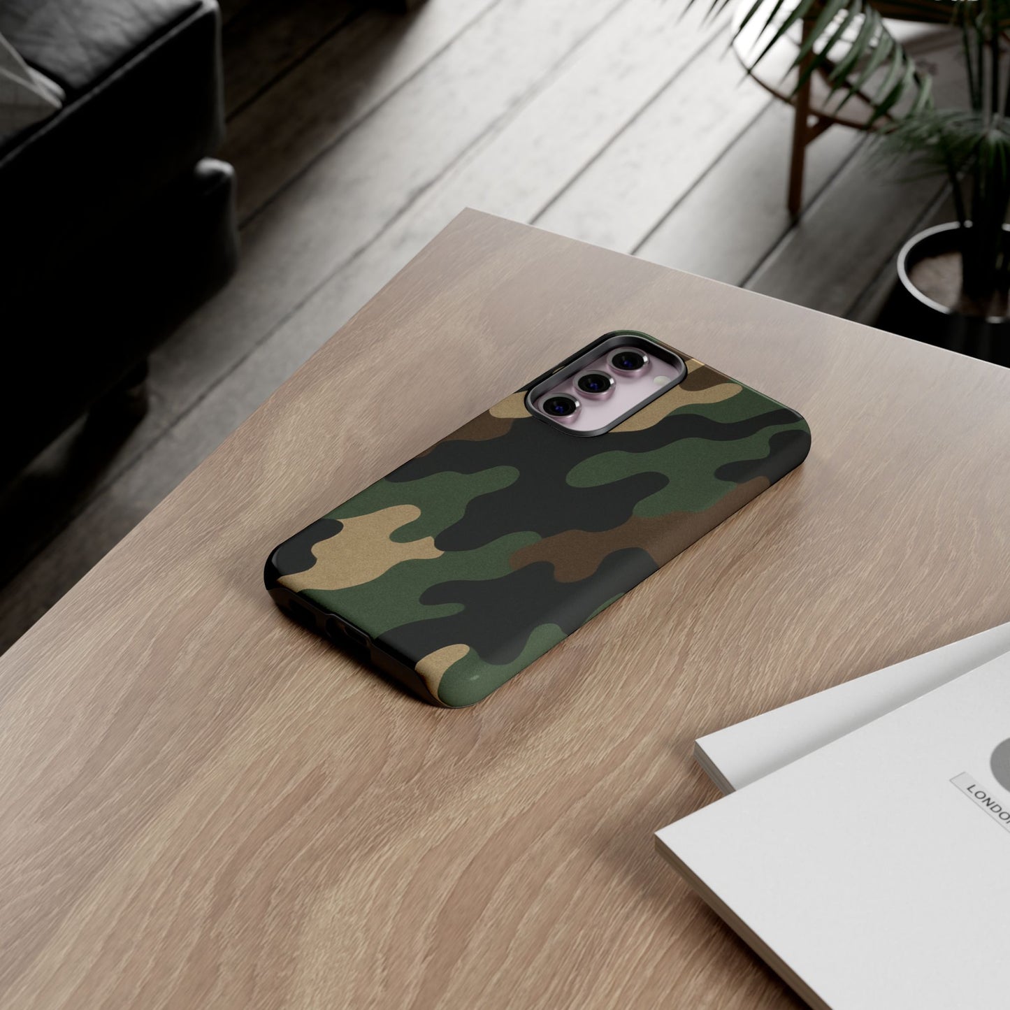 Rugged military green camo phone case from Printify providing durable protection for a smartphone.