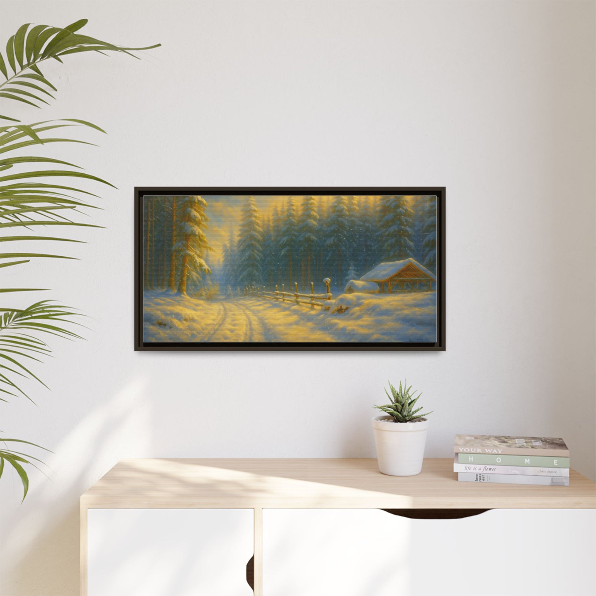 Framed winter cabin canvas print by Printify featuring a snowy forest sunset scene for wall decor.
