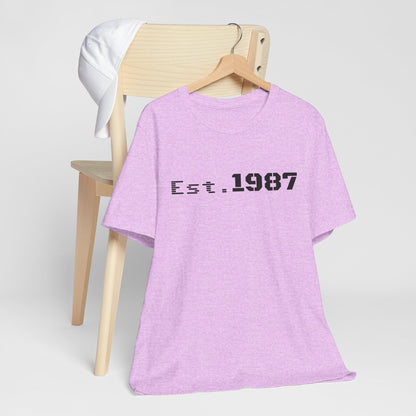 Vintage Est. 1987 T-shirt by Printify featuring retro design and bold "Born 1987" text on a casual cotton tee.