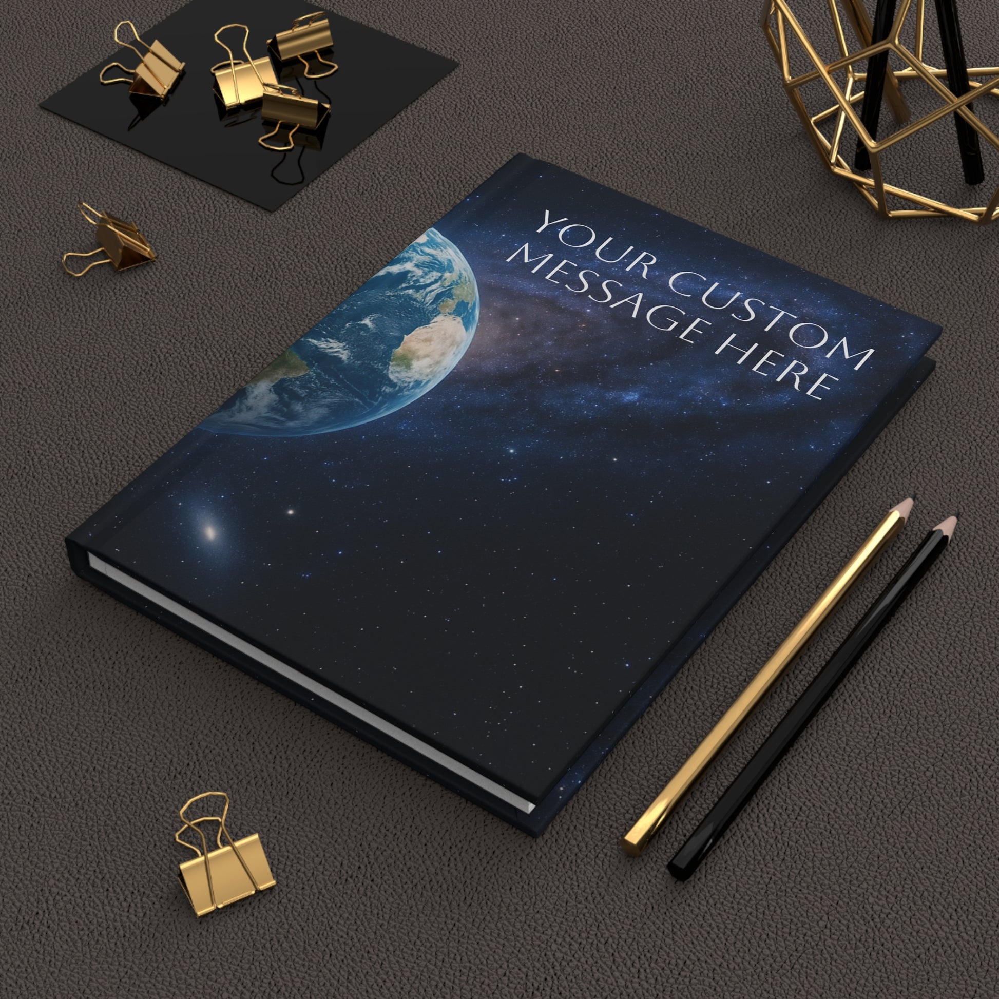 Hardcover galaxy night sky journal with Earth from space design, featuring space-themed print on a durable notebook by Printify.