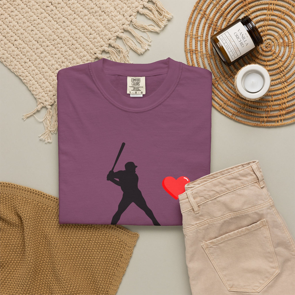 White baseball batter heart T-shirt by Printify featuring a graphic of a batter holding a heart-shaped bat on the front.