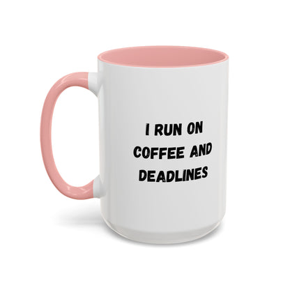 White ceramic coffee mug with "I Run on Coffee and Deadlines" printed in black lettering, suitable for office or home use.