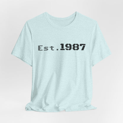 Vintage Est. 1987 T-Shirt by Printify featuring a classic design celebrating the birth year on a casual tee.