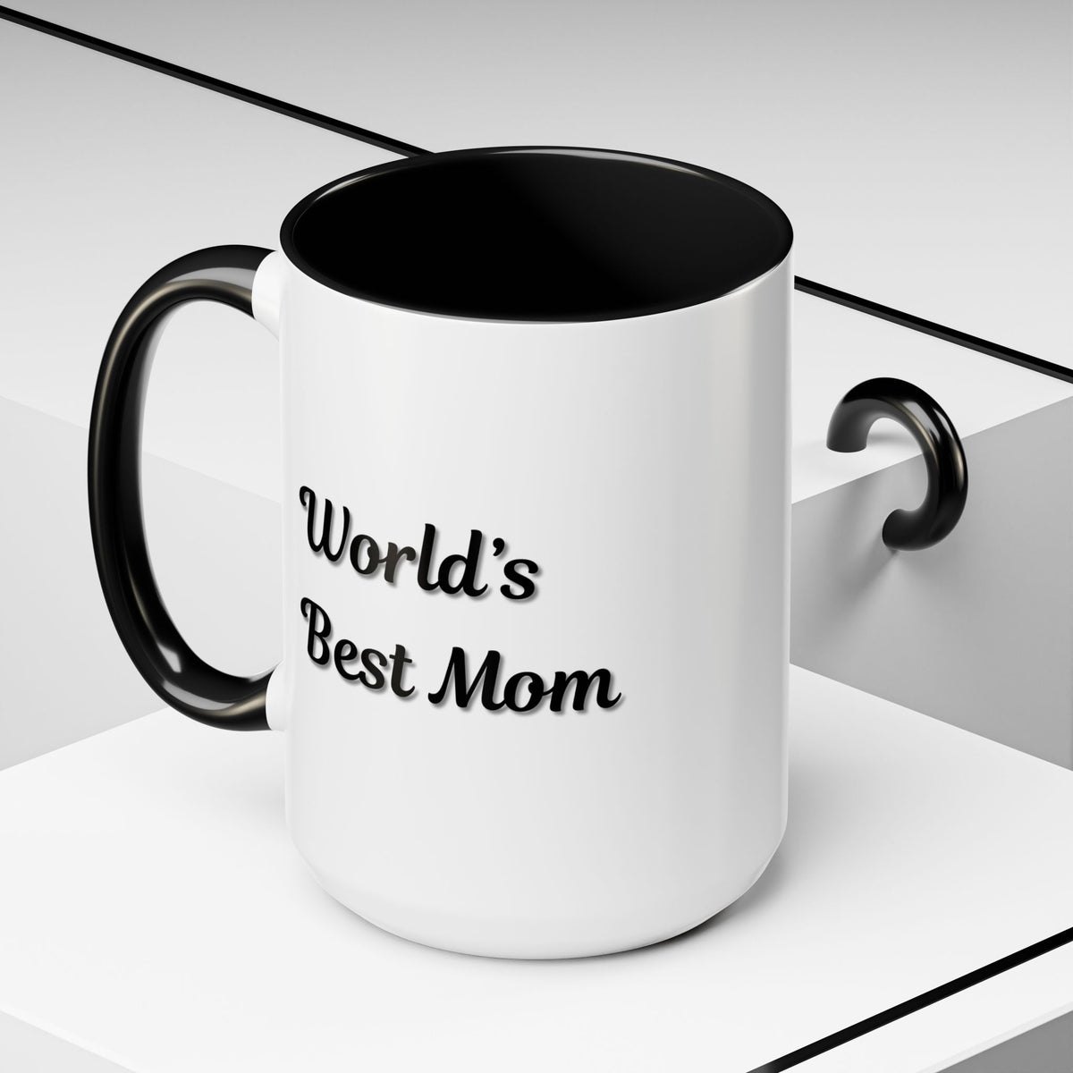 Black-trim ceramic mug with "World's Best Mom" text, perfect for Mother's Day gift, by Printify.
